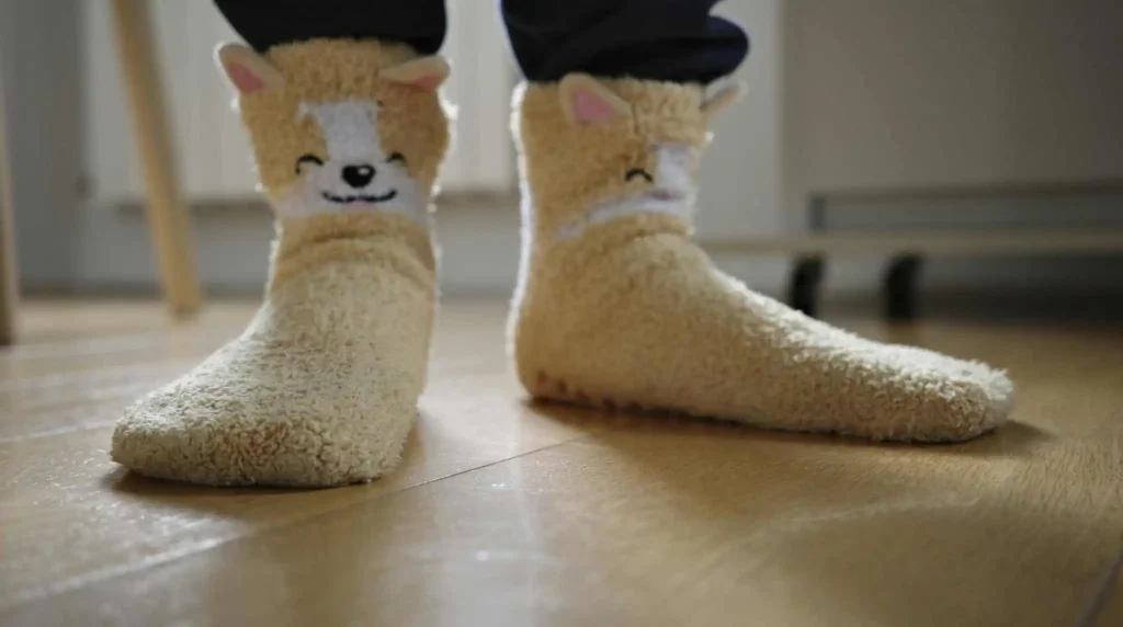 Current image: 9 best sensory sock options for adults displayed flat Smartknit Bombas Boody Balega Toe Sox comparison