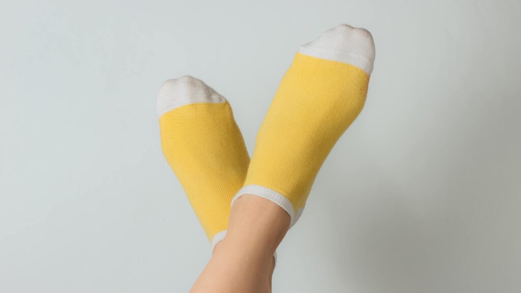 types of seamless socks for sensory issues adults displayed side by side — Smartknit Bombas Boody Balega comparison